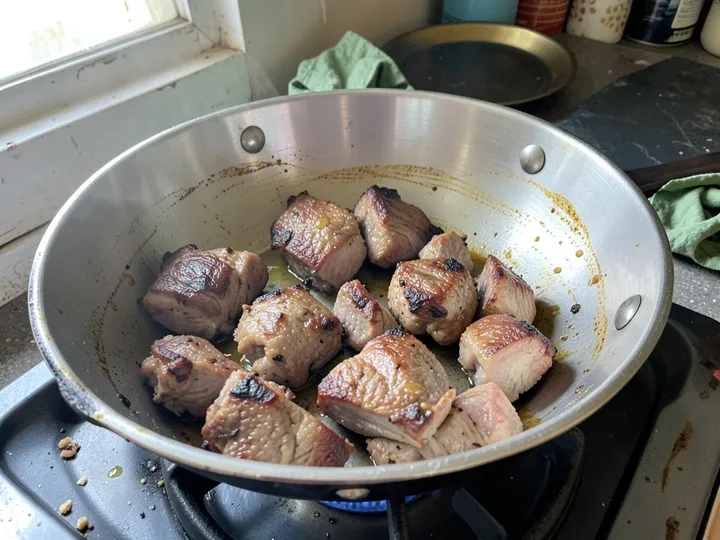 Step 1 of Slow Cooker Lamb Curry with Coconut Milk: Pat the lamb dry and toss with the salt